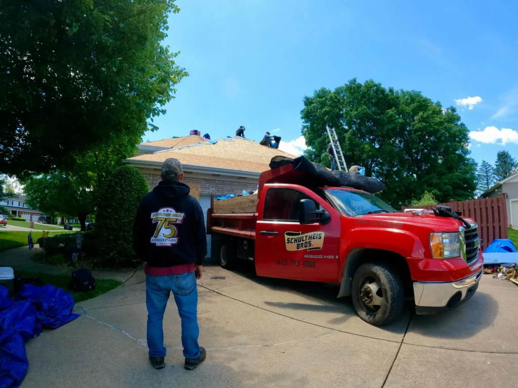 Schultheis Bros. at a roofing job, trusted for roofing services in Pittsburgh